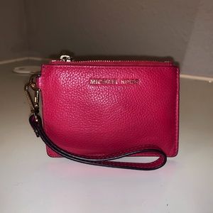 hot pink MK wristlet